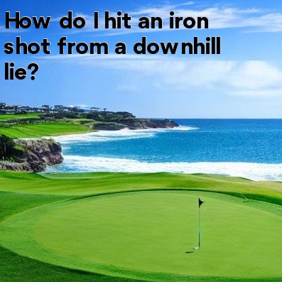 How do I hit an iron shot from a downhill lie